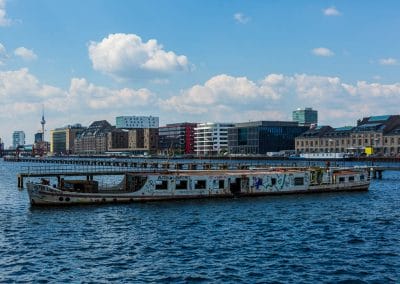 The MS Dr. Ingrid Wengler, and abandoned boat on the Spree river in Berlin